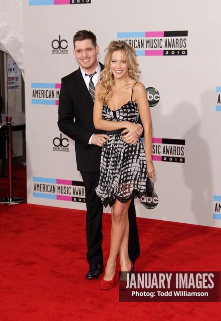 LOS ANGELES, CA - NOVEMBER 21:  Singer Michael Buble and Debbie Timuss arrive at the 2010 American Music Awards held at Nokia Theatre L.A. Live on November 21, 2010 in Los Angeles, California.  (Photo by Todd Williamson/JanuaryImages)