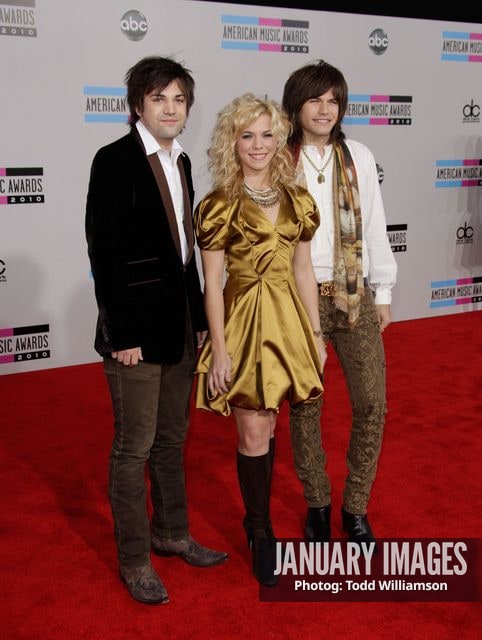 LOS ANGELES, CA - NOVEMBER 21:  (L-R) Musicians Neil Perry, Kimberly Perry and Reid Perry of The Band Perry arrive at the 2010 American Music Awards held at Nokia Theatre L.A. Live on November 21, 2010 in Los Angeles, California.  (Photo by Todd Williamson/JanuaryImages)