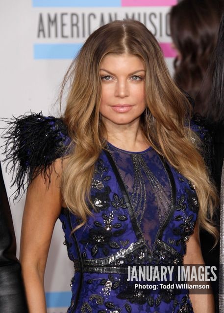 LOS ANGELES, CA - NOVEMBER 21:  Singer Fergie arrives at the 2010 American Music Awards held at Nokia Theatre L.A. Live on November 21, 2010 in Los Angeles, California.  (Photo by Todd Williamson/JanuaryImages)