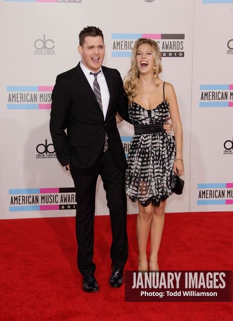 LOS ANGELES, CA - NOVEMBER 21:  Singer Michael Buble and Debbie Timuss arrive at the 2010 American Music Awards held at Nokia Theatre L.A. Live on November 21, 2010 in Los Angeles, California.  (Photo by Todd Williamson/JanuaryImages)
