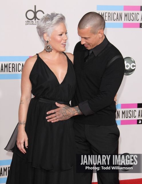 LOS ANGELES, CA - NOVEMBER 21:  Singer Pink and Carey Hart arrive at the 2010 American Music Awards held at Nokia Theatre L.A. Live on November 21, 2010 in Los Angeles, California.  (Photo by Todd Williamson/JanuaryImages)