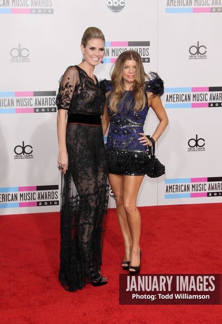 LOS ANGELES, CA - NOVEMBER 21:  Model Heidi Klum and Singer Fergie arrive at the 2010 American Music Awards held at Nokia Theatre L.A. Live on November 21, 2010 in Los Angeles, California.  (Photo by Todd Williamson/JanuaryImages)