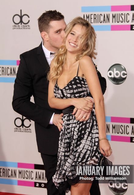 LOS ANGELES, CA - NOVEMBER 21:  Singer Michael Buble and Debbie Timuss arrive at the 2010 American Music Awards held at Nokia Theatre L.A. Live on November 21, 2010 in Los Angeles, California.  (Photo by Todd Williamson/JanuaryImages)